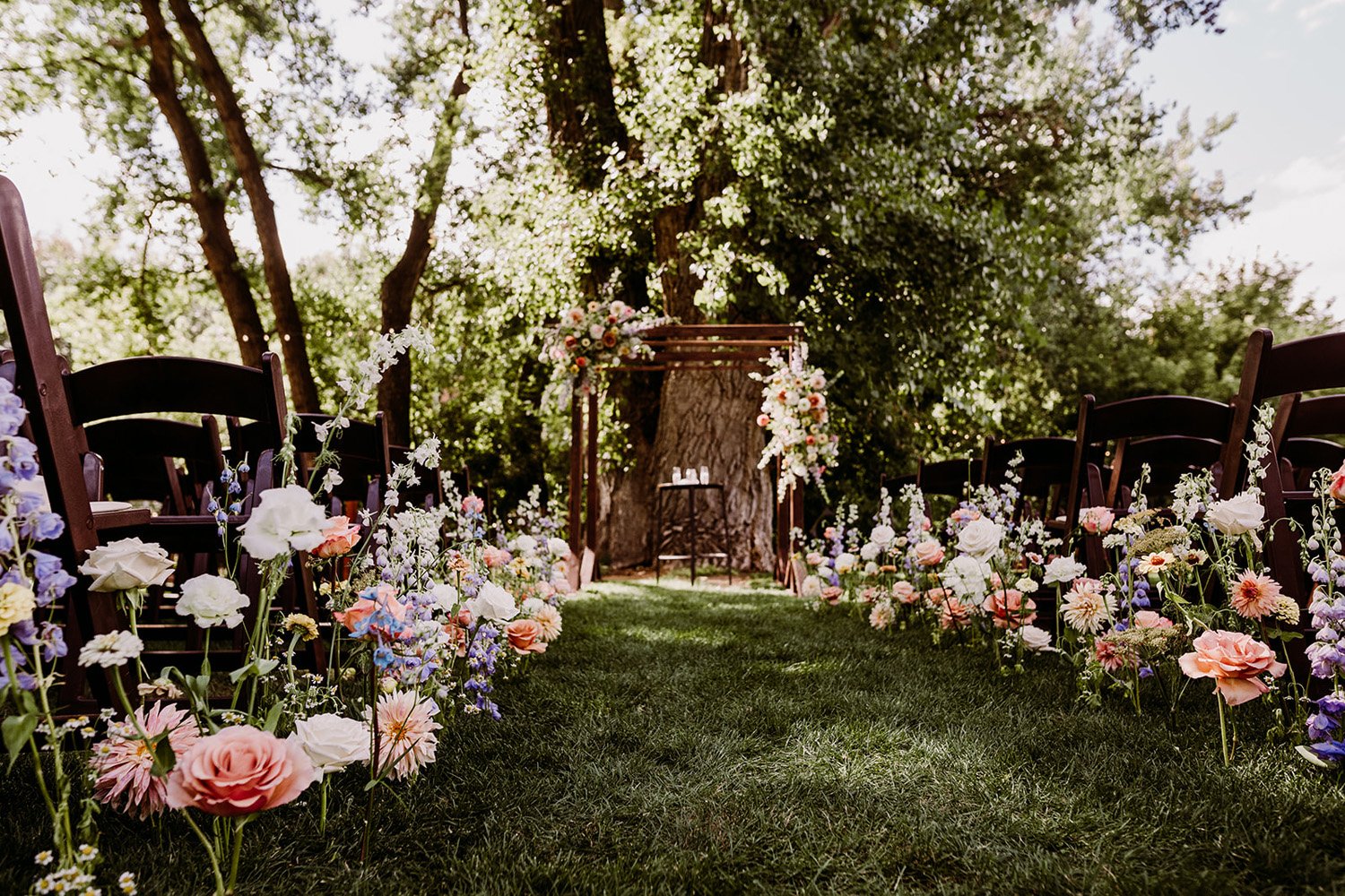 Plume&Furrow-Colorado-Wedding-Florist-Emily&Charlie-TaylerCarlislePhoto-Farmette-September-aisle-decor-garden.jpg