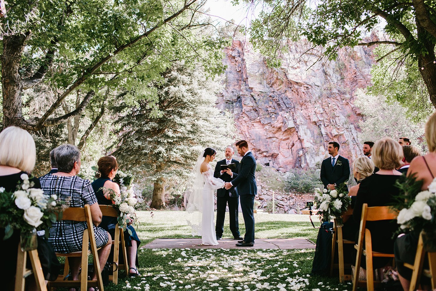 Plume&Furrow-Wedding-Florist-Megan&Jack-TaylerCarlislePhoto-RiverBend-August-Colorado-ceremony-vows.jpg