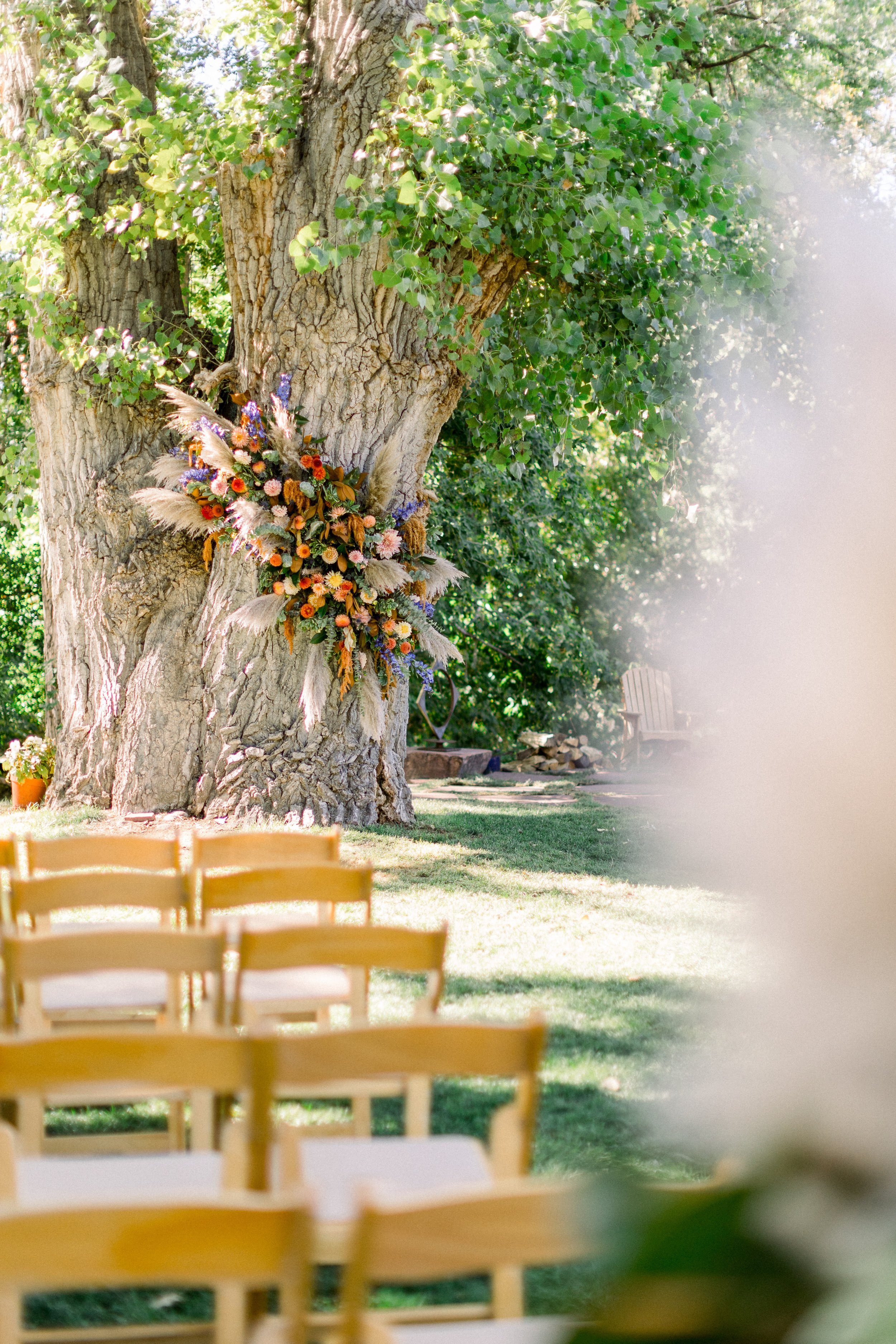 Plume&Furrow-Weddinf-Florist-Taylor&Ryan-ChelseaSliwaPhotography-Lyons-Farmette-September-Colorado-Ceremony-Decor-Floral-Tree-Wrap.jpg
