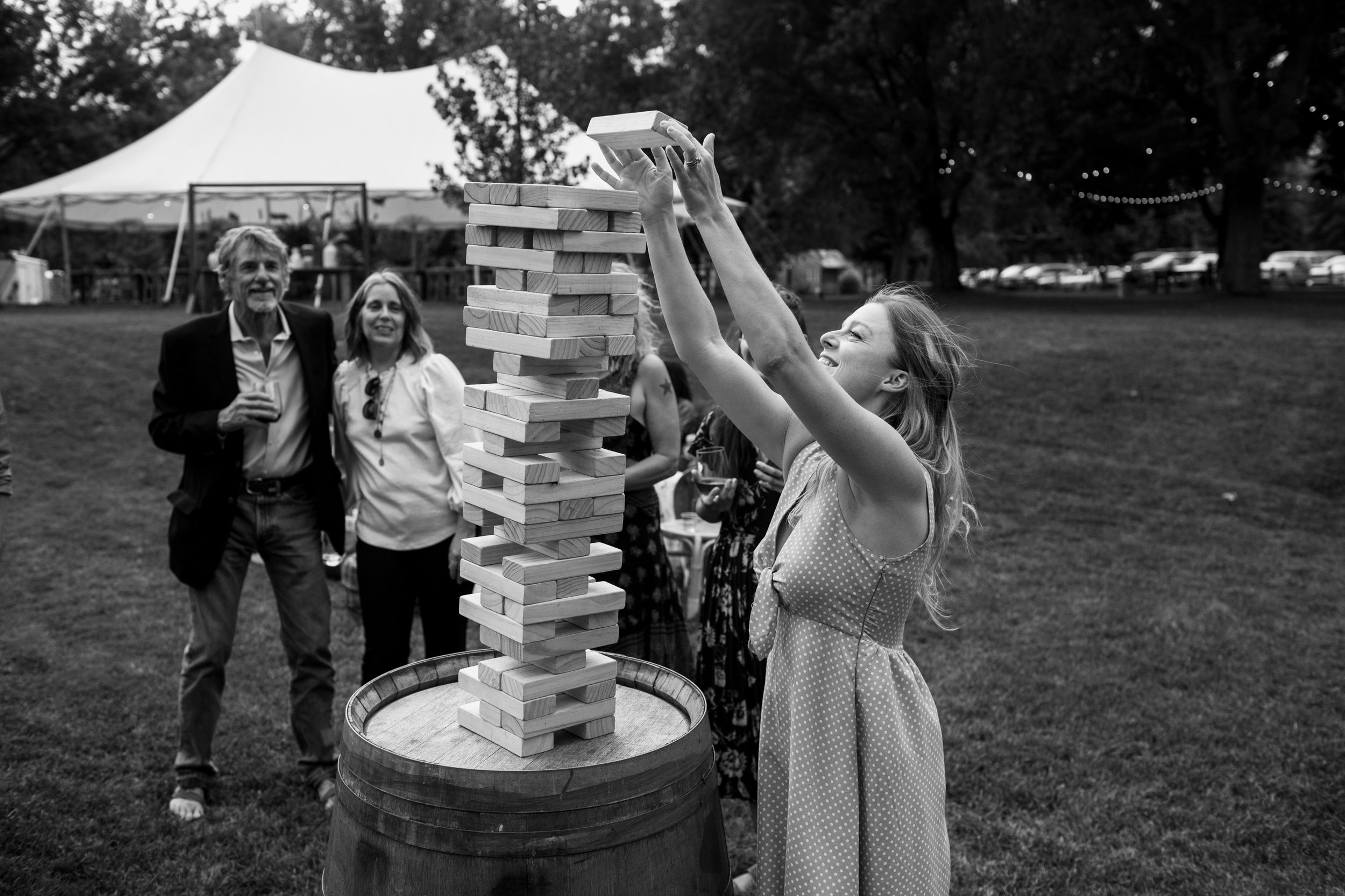 Plume&Furrow-Wedding-Florist-Kayla&Scott-AdamHouseman-River-Bend-September-Colorado-Black-White-Jenga-Game.jpg