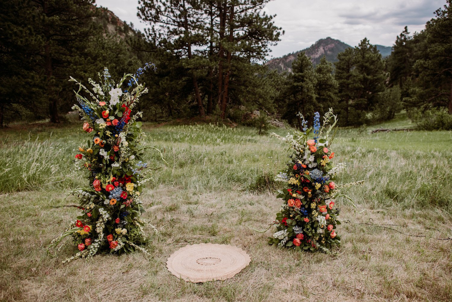 Plume&Furrow-Wedding-Florist-Talie&Forrest-Boulder-County-Colorado-TaylerCarlisle-ceremony-flower-pillars.jpg