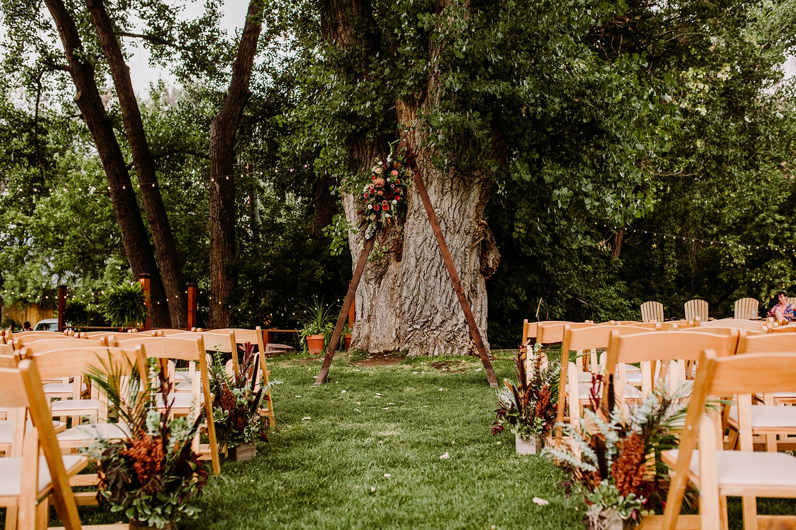 Plume&Furrow-WeddingFlorist-Emily&Eva-TaylerCarlisle-LyonsFarmette-September-Colorado-Triangle-Arbor-Aisle-Decor.jpg