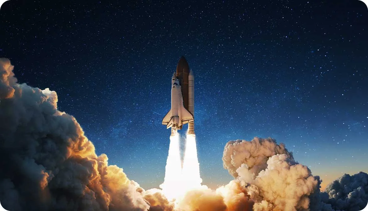 A dramatic photo of a rocketship launching from an Earth-orbit pad into space, showcasing the rapid implementation and launch capabilities of the Travel Curious Unified Experiences Platform.