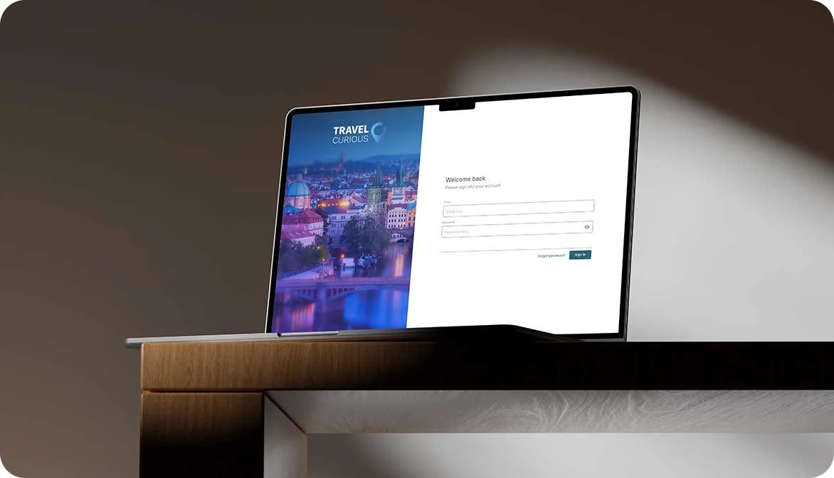 A laptop mockup displaying the login portal for the Travel Curious Activate 2.0 hotel experience management software dashboard.