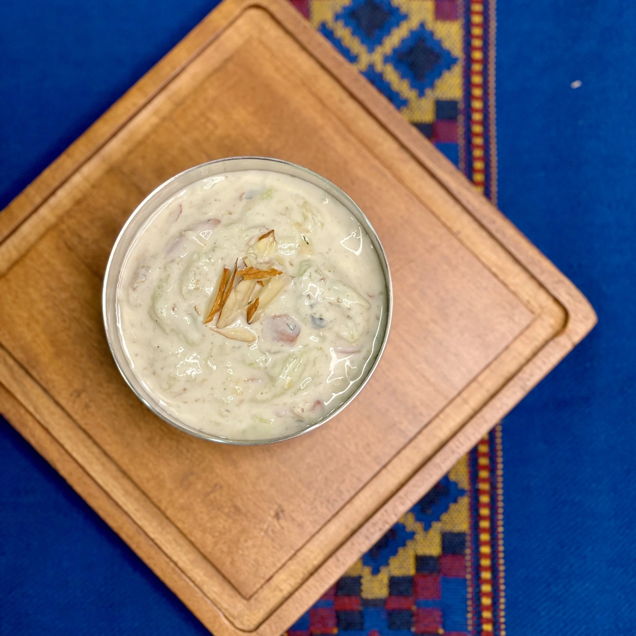 cucumber almond raita10 almonds, slivered 100g whisked yogurt  50g shredded cucumber, squeeze water ¼ tsp roasted cumin powder ¼ tsp salt  ¼ tsp chaat masala  2 tsp finely chopped mintRoast almonds in oven at 190C for a couple of minu…