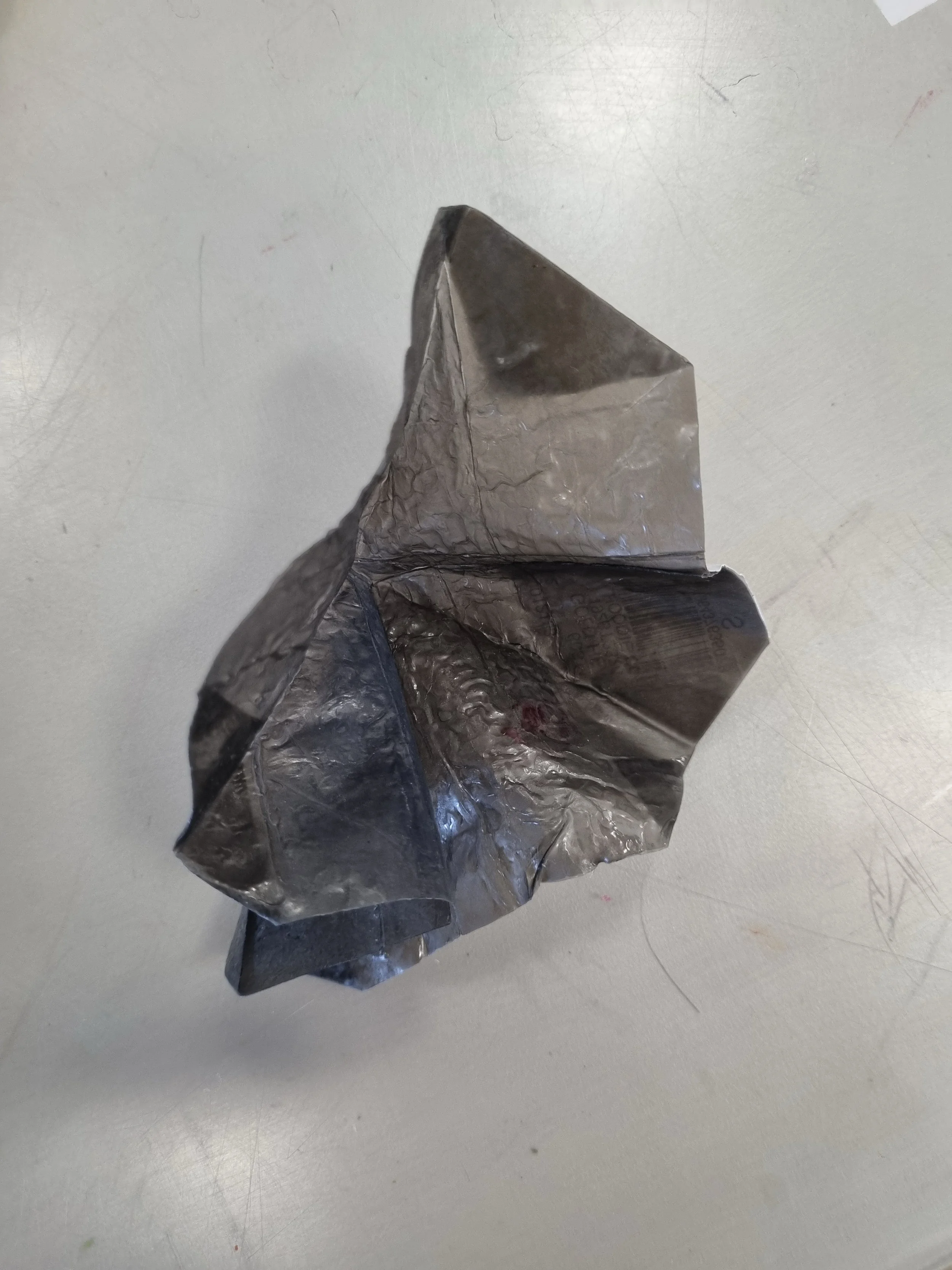 Using heat to create layers and strength. The plastic can now be folded, pleated or formed into new 3D forms.