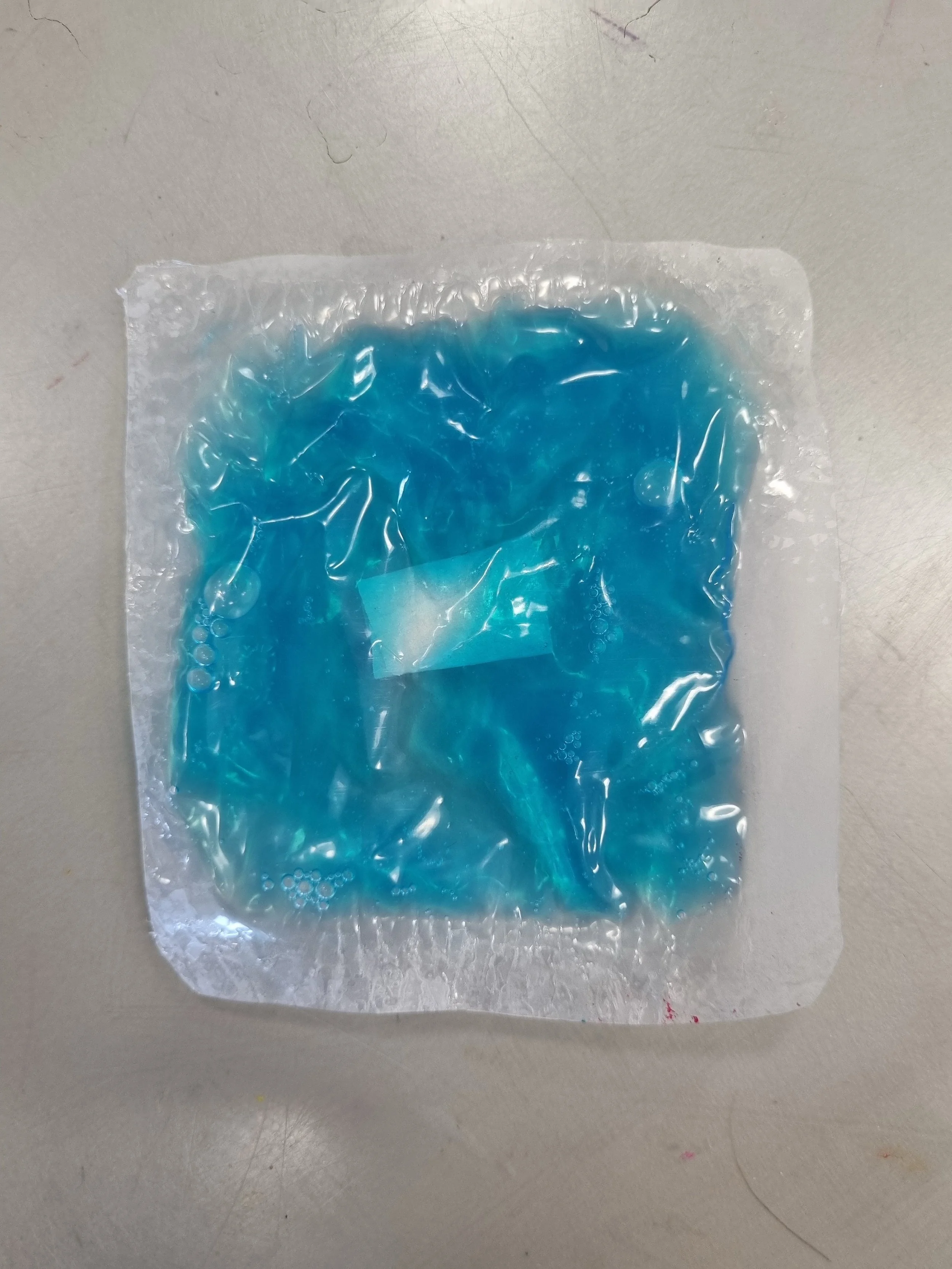 Encasing liquids using heat.