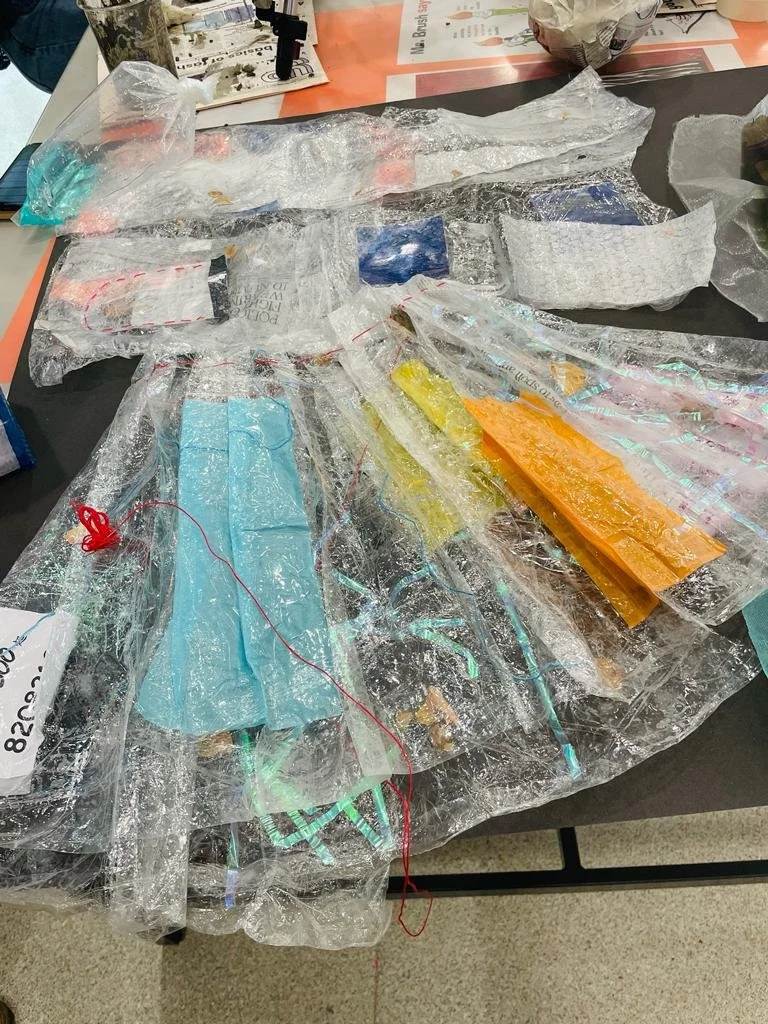 Textiles and garments created from crafted plastic textile.