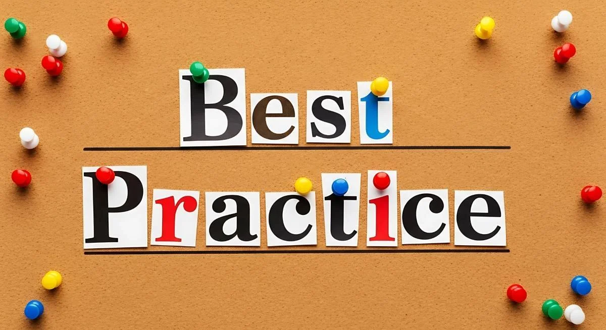 words best practices spelled on cork board