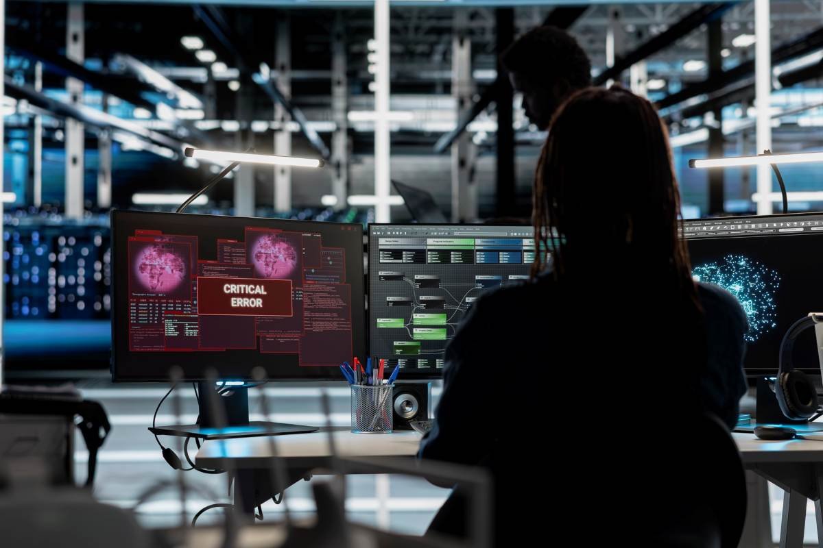 Data center employee receiving critical error popup while using artificial intelligence visualization tools