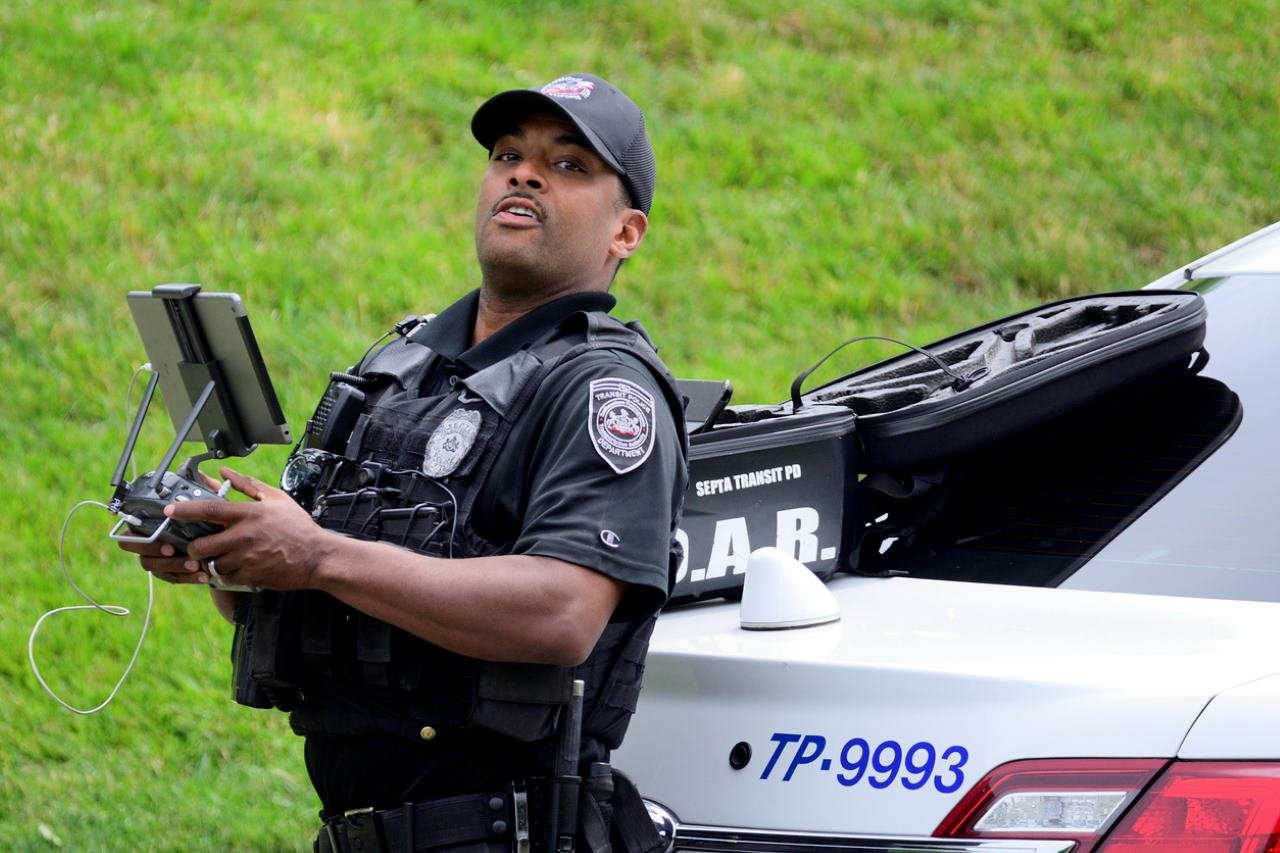 police officer pilots a drone
