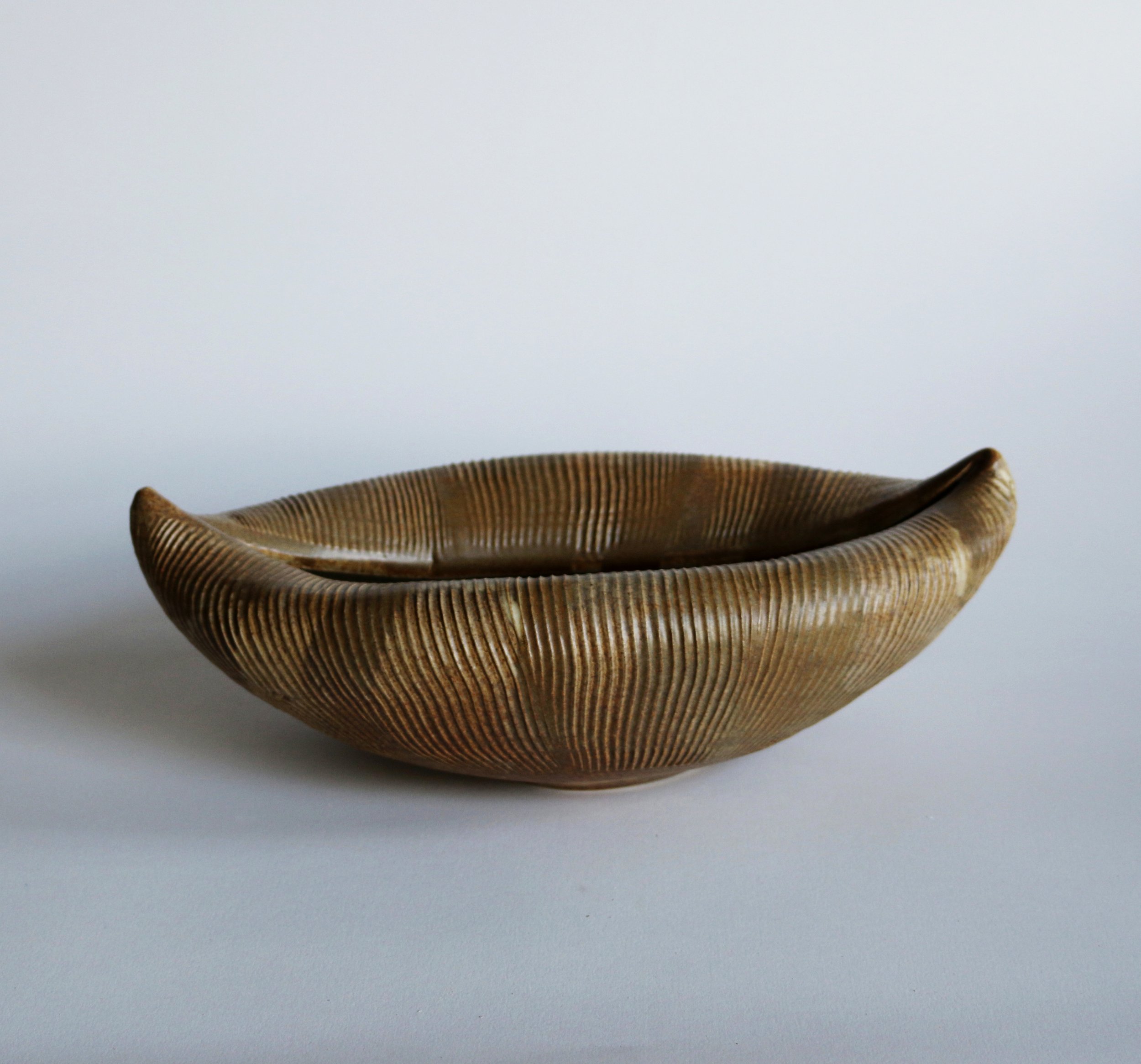 Boat Vessel (2022) thrown, textured and altered stoneware vessel.