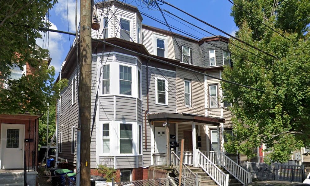 Attached 3 family in Winter Hill near Gilman Square in Somerville