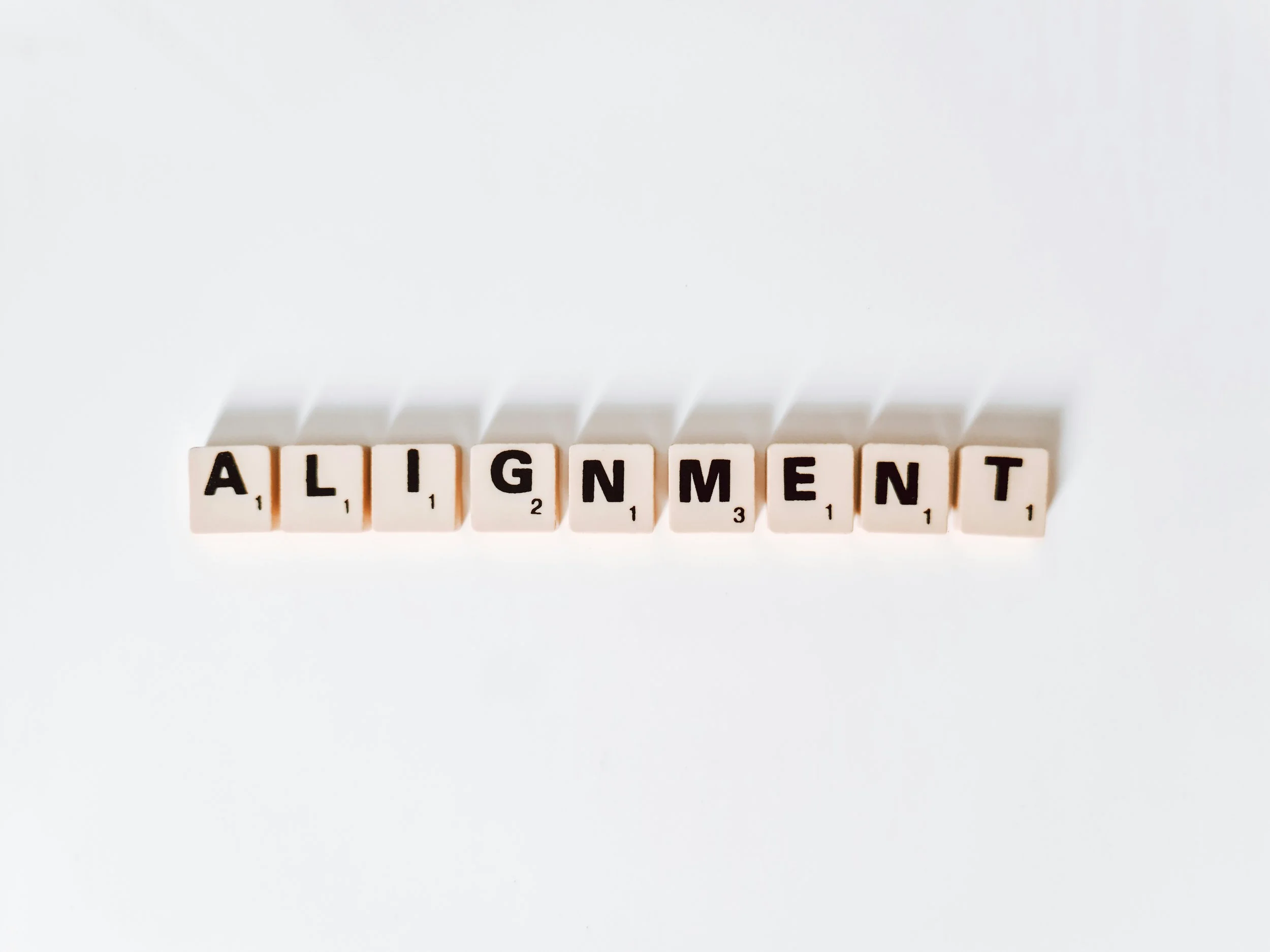 Why Alignment Gets Harder as Companies Mature