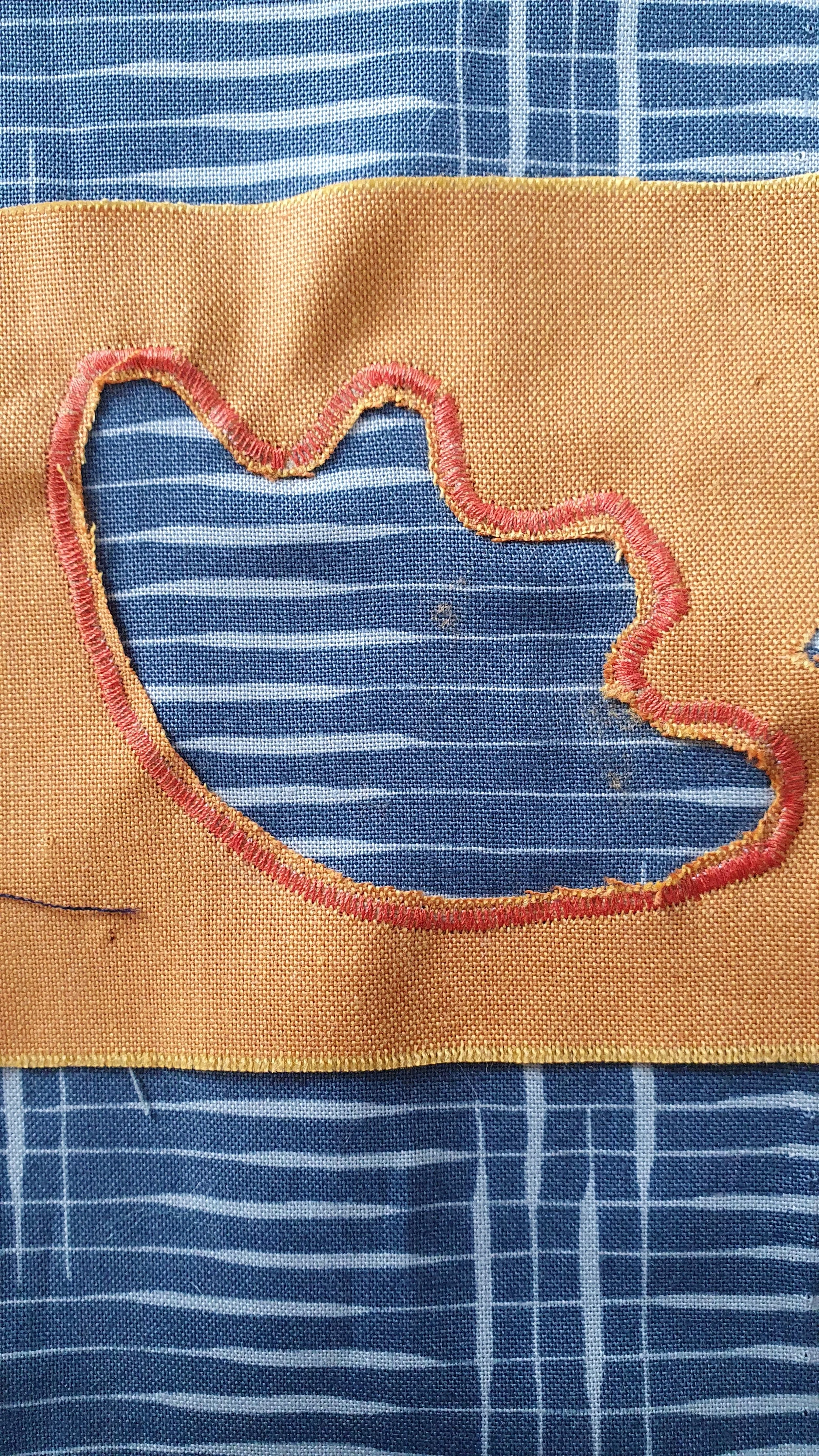 reverse applique satin stitch.jpg