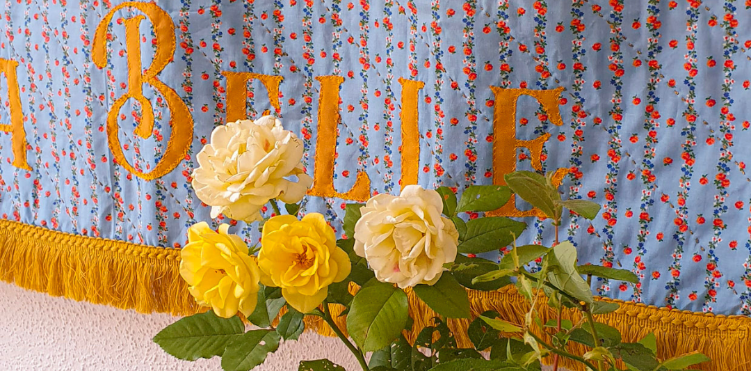 patchwork applique with yellow roses