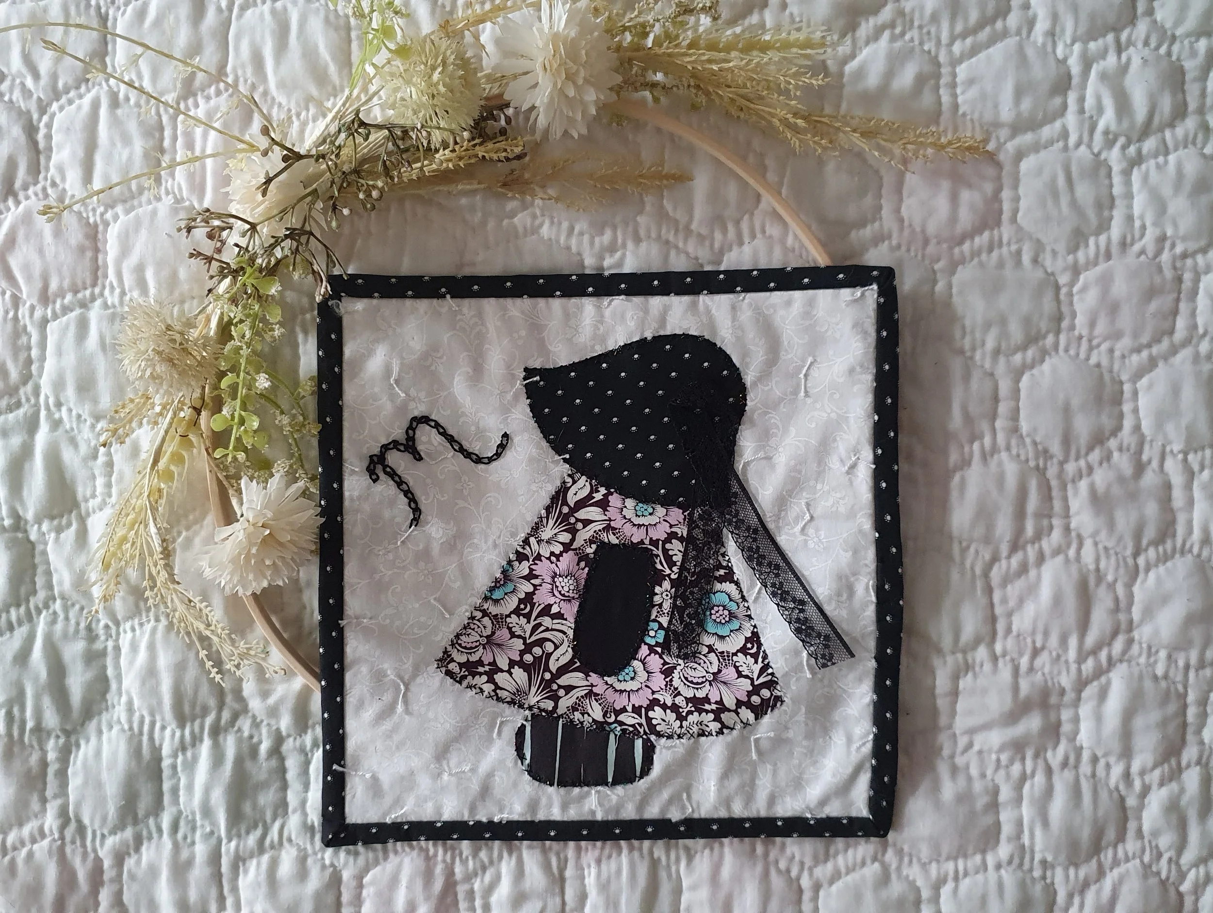 Sunbonnet Sue patchwork with ribbon