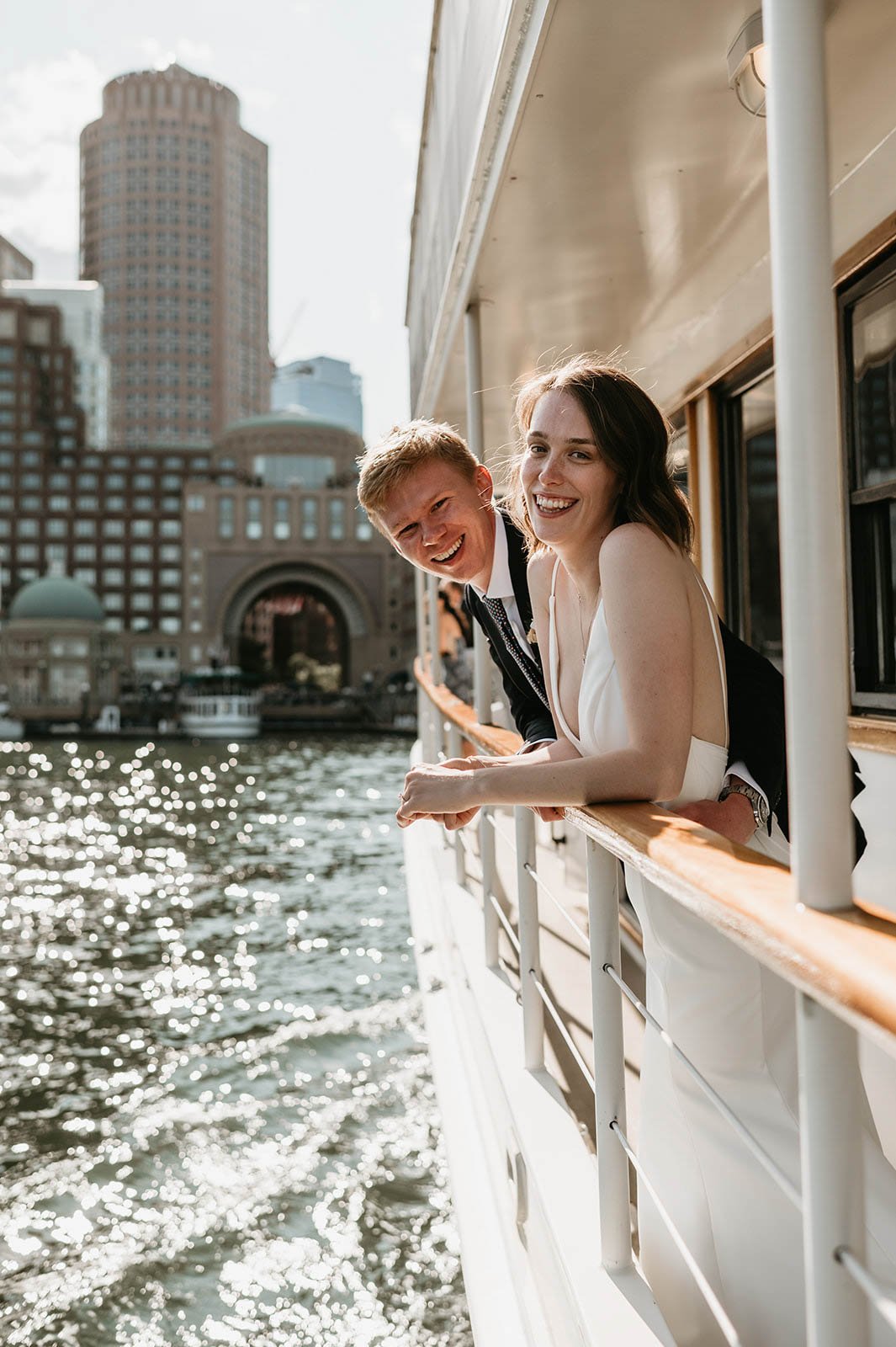 Event yacht bride and groom relaxing onboard.jpeg