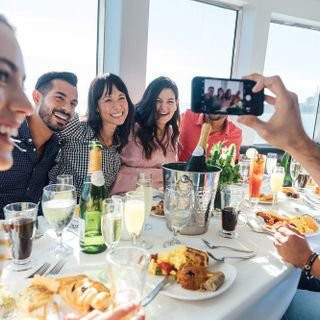 Brunch onboard with friends smilling 2024.jpeg