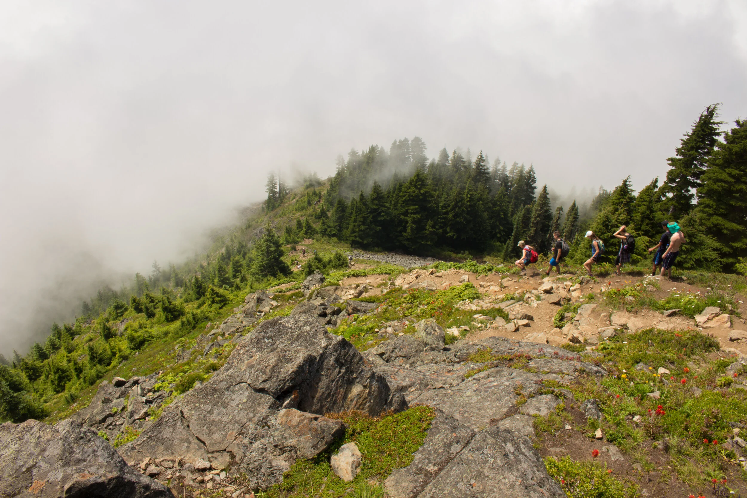 Hikes descend into the clouds on Mailbox Peak.