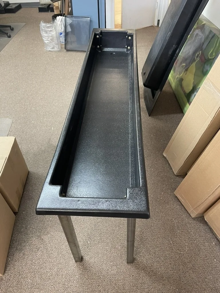 Prototype of our new and improved black plastic outdoor handwashing station.