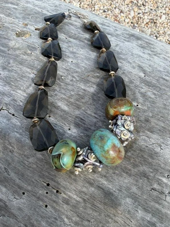 smoky quartz and agate cluster outside 2.jpg