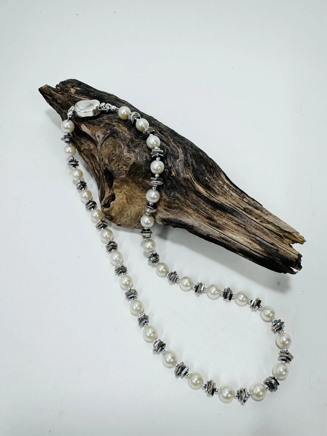 l peyser custom necklace for cousin w more pearls display.jpg