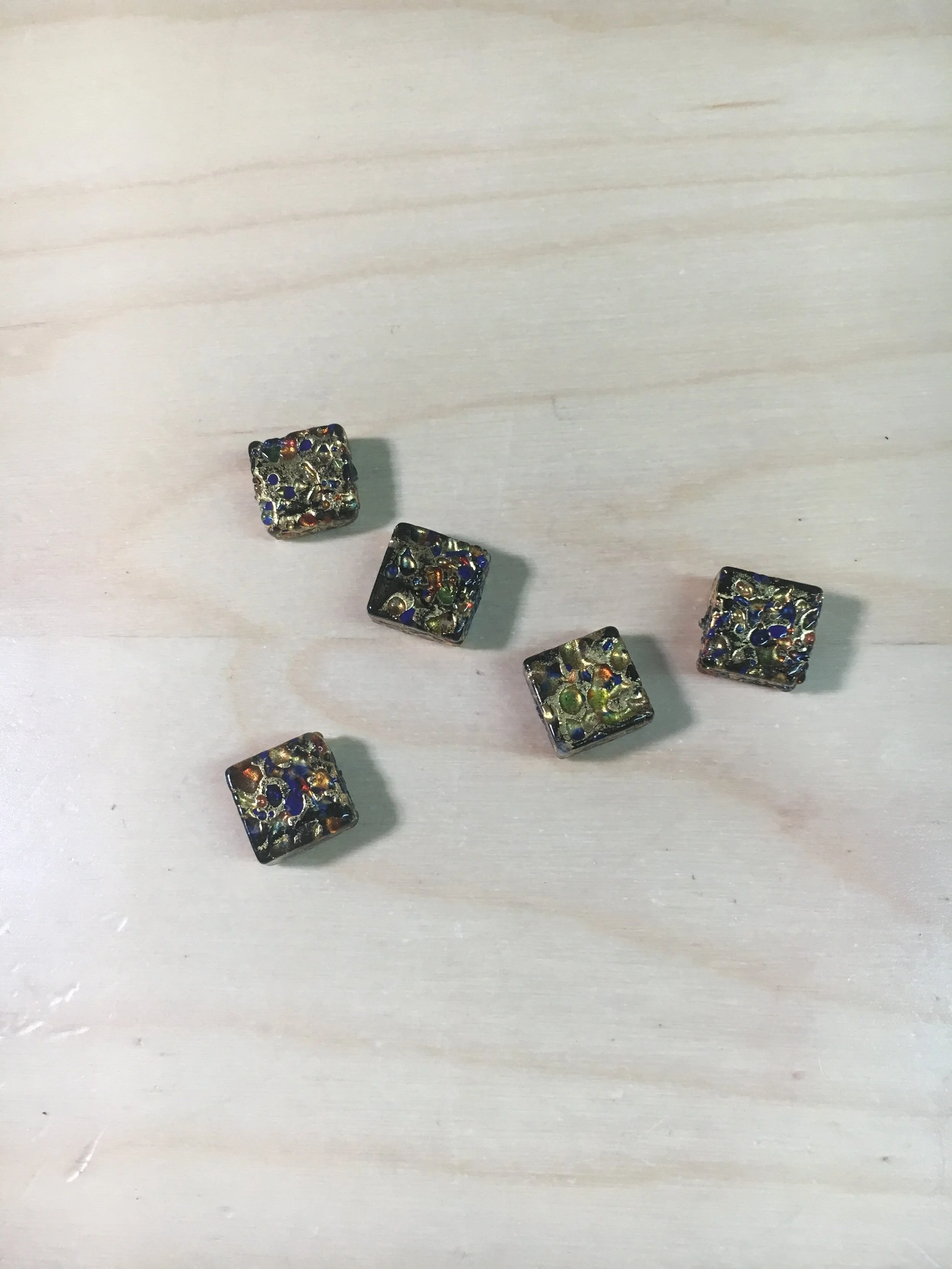 My client had 5 magnificent, Murano glass beads that she purchased in Italy.  
She had them for many, many years and didn't know what to do with them, but then found me at an art show....
