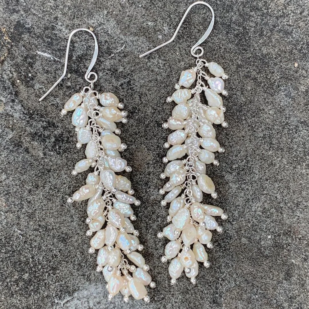 Very long rice pearl dangle earrings.  Tons of movement and very comfortable.