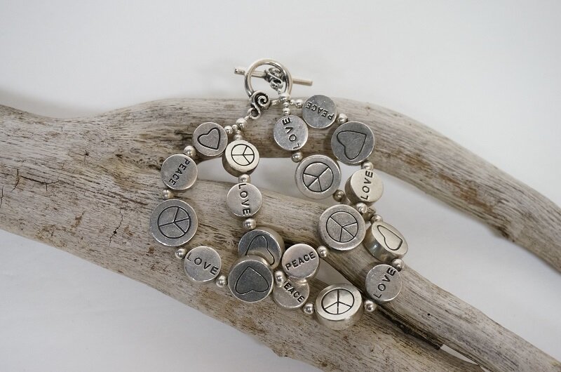 End result is now one bracelet- that is no longer on elastic.  