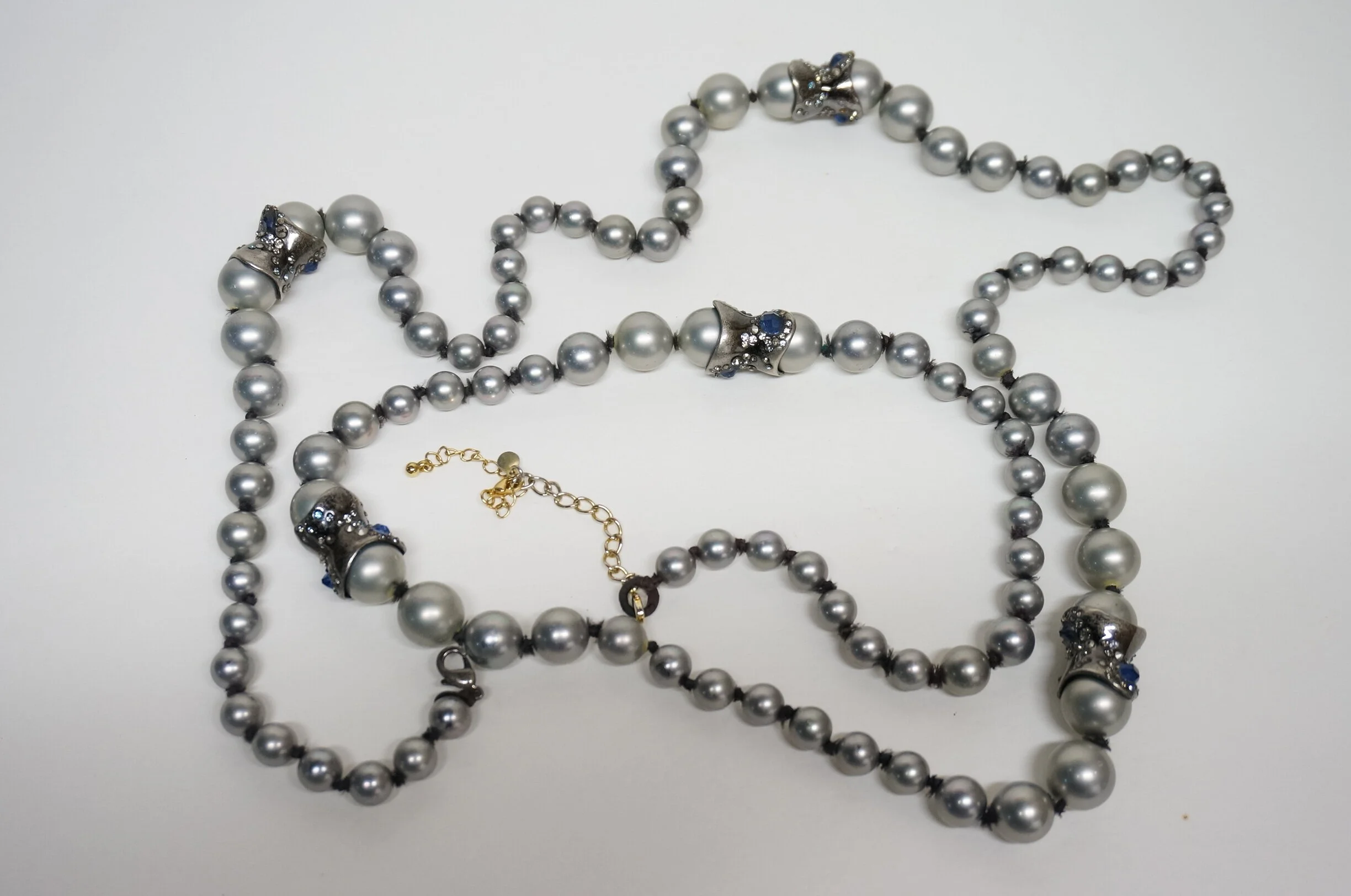 Alexis Bittar necklace that broke and was poorly repaired and not to the satisfaction of my client.