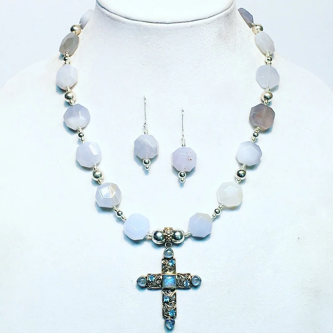 End result- I incorporated hand cut and natural chalcedony and sterling silver.  Earrings to match.
Definite upgrade and very complementary to the original piece.