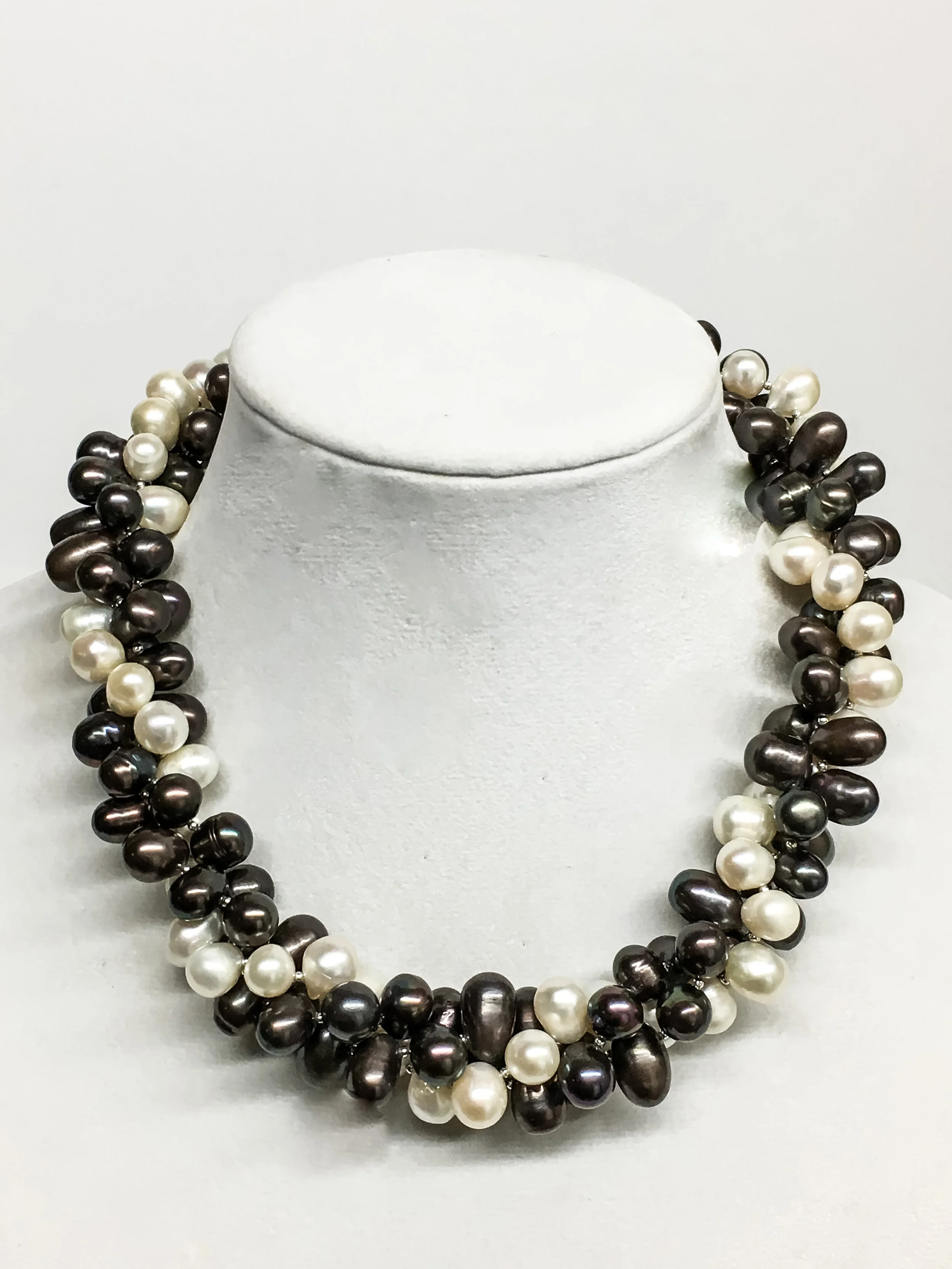 A torsade necklace that needed to be completely restrung and a new toggle closure incorporated as opposed to the original lobster clasp.