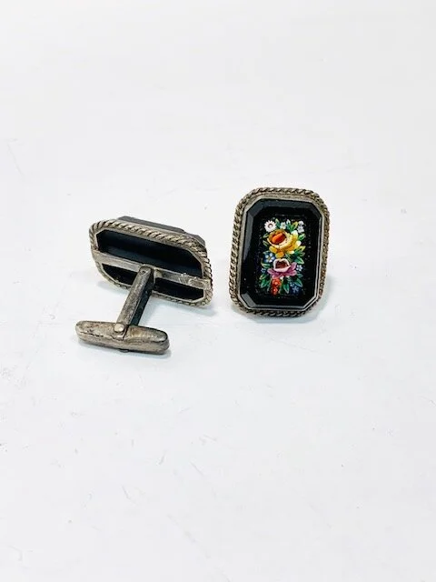 A client had a pair of her father's cufflinks.  They have a lot of sentimental value, but she did not use them.  She entrusted them to me to come up with a design so that she would be able to utilize and enjoy them.  
After going back and forth with 