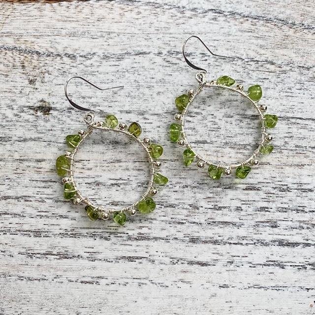 2 pairs of hoop earrings- 1 for each of her daughters- in this style.