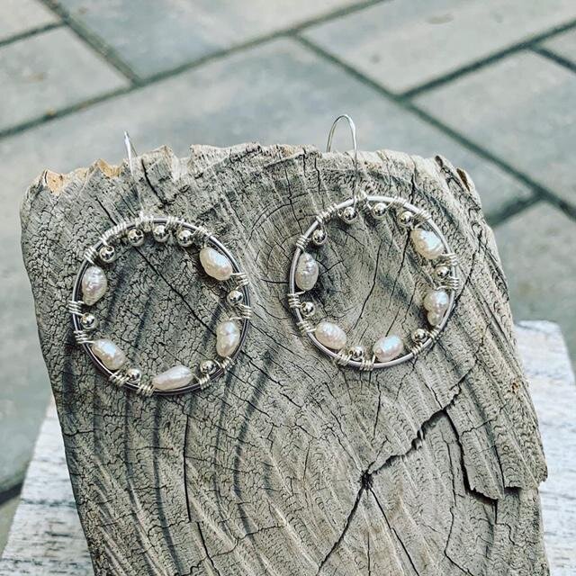 2 pairs of hoop earrings- 1 for each of her daughters- in this style.