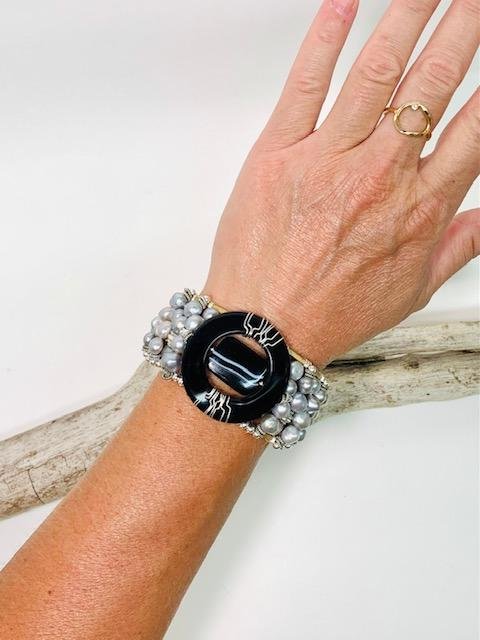 onyx and onyx w silver pearls cuff on.jpg