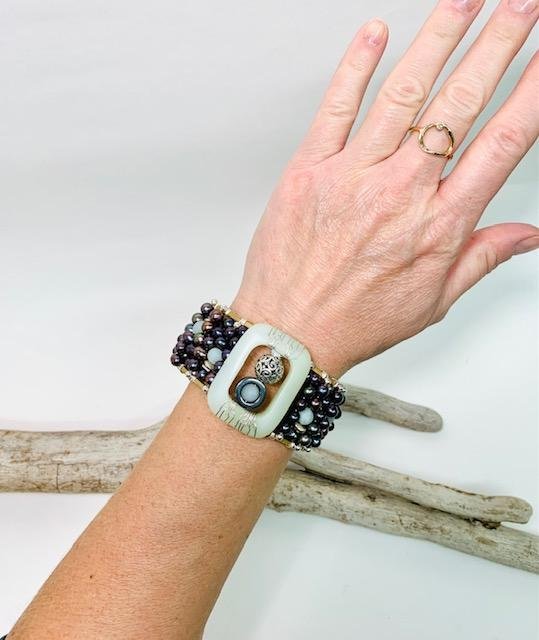 jade and peacock pearl cuff on.jpg