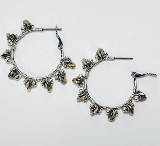 silver on silver disc hoops flat.jpg