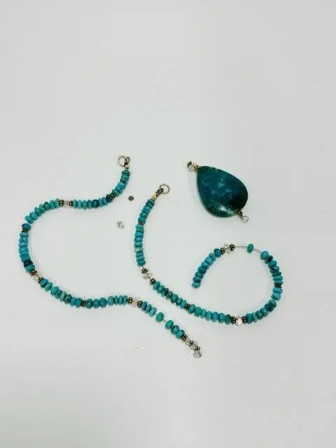 Before:  1 of 2 repairs:   a client stopped in at the Pagio Gallery inquiring if I restrung broken necklaces.  She also shared she had a bit of a time constraimt as she was attending an upcoming wedding and would like to wear either of the 2 necklace
