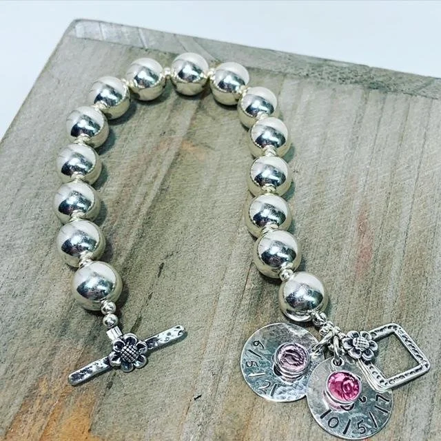 l peyser gma bracelet w new charm on wood 2.jpg