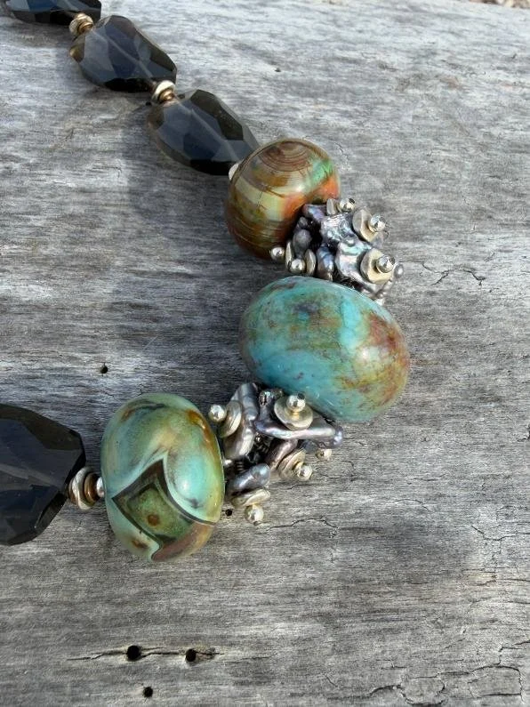smoky quartz and agate cluster outside.jpg
