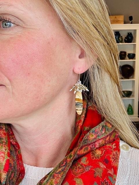 sandstone cluster earrings on.jpg