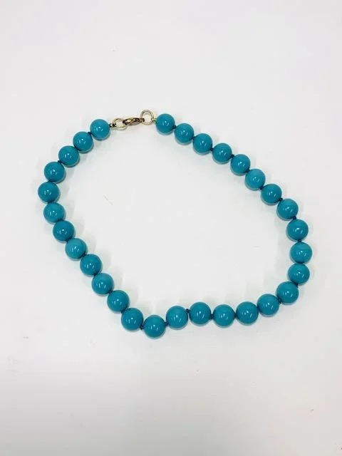 Before:  My client had this vintage blue (possibly turquoise) necklace with 14kt gold clasp and wanted it re-invented into 5 necklaces- 1 for each niece, daughter in law, her sister and herself.  