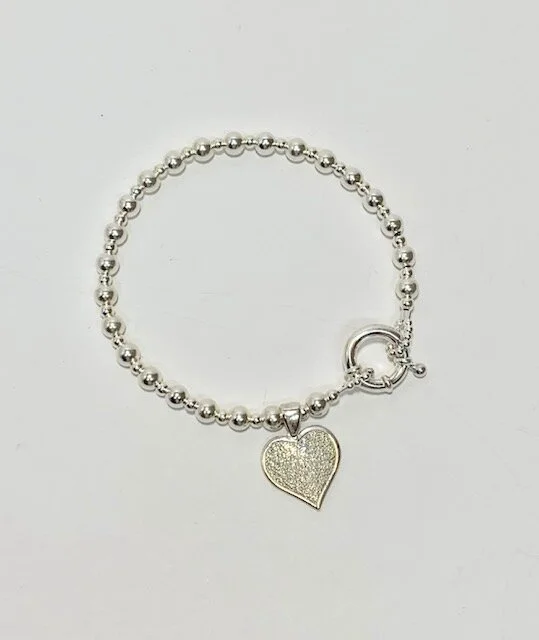 caroline kingston grandpa bracelet.jpg