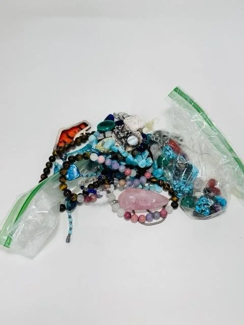 Before:  A client came to me with a large bag of broken and/or piece she didnt like and requested to be redesigned or repaired.  