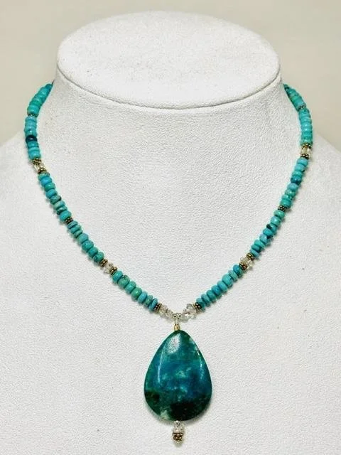 After:  I deconstructed her old piece- pendant included and completely rebuild her necklace.  Supplementing some spacer beads where needed that were lost when the piece broke.  