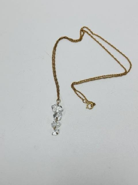 Before:  A client mined these Herkimer diamonds as a little girl in her most favorite place on earth in upstate NY.  However, she was not entirely pleased with the design work another jewelry artist did for her.  She wanted a piece that was "more sec