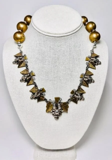 After:  After cleaning and polishing, I reshaped several bent parts.  This one took a while only because I did not like any design I attempted.  Long, short, stones, metals, etc.  none of them looked favorable.  Then I came across these 16mm vintage 