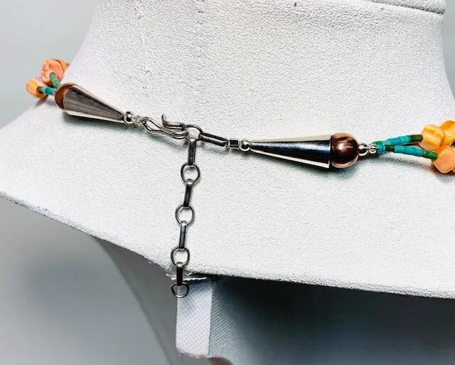 Closure to the double strand necklace.